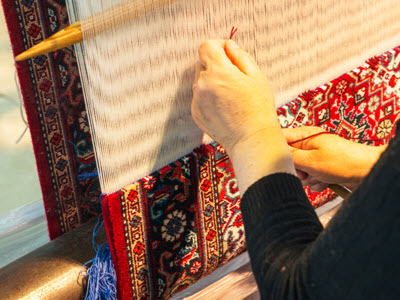 Silk Oriental rug weaving